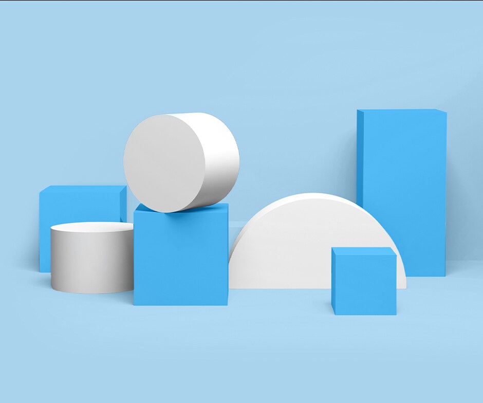 cylindres blancs et cubes bleus de différentes tailles dans un fond bleu clair