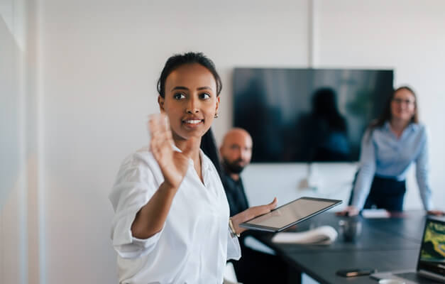 Group of People discussing in office conference room