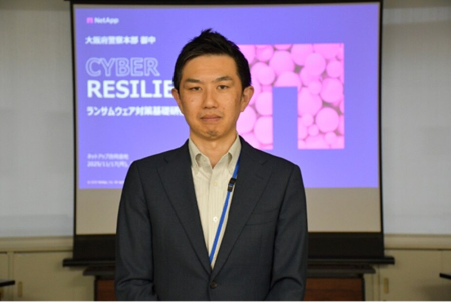 Person standing in front of screen