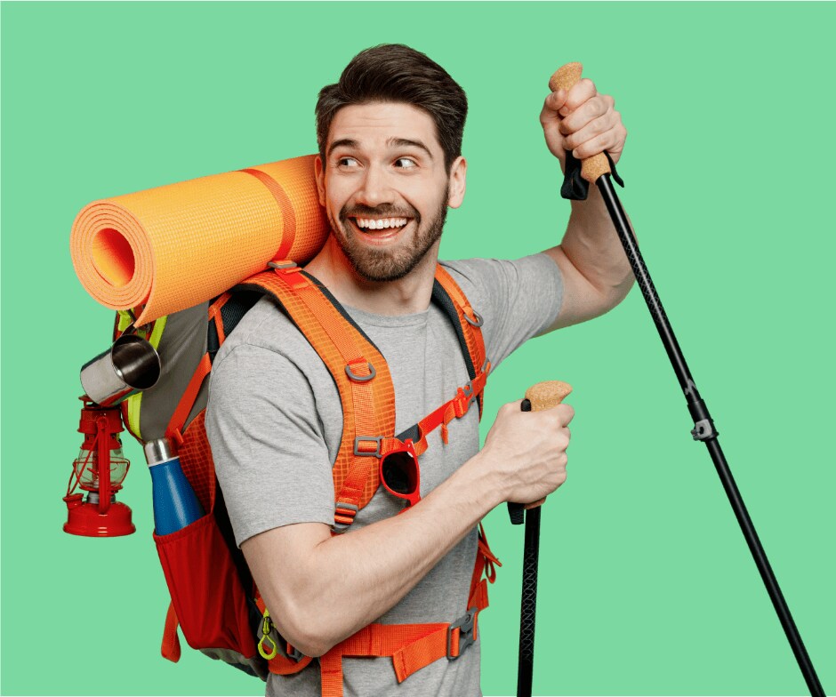 person with hiking gear on smiling