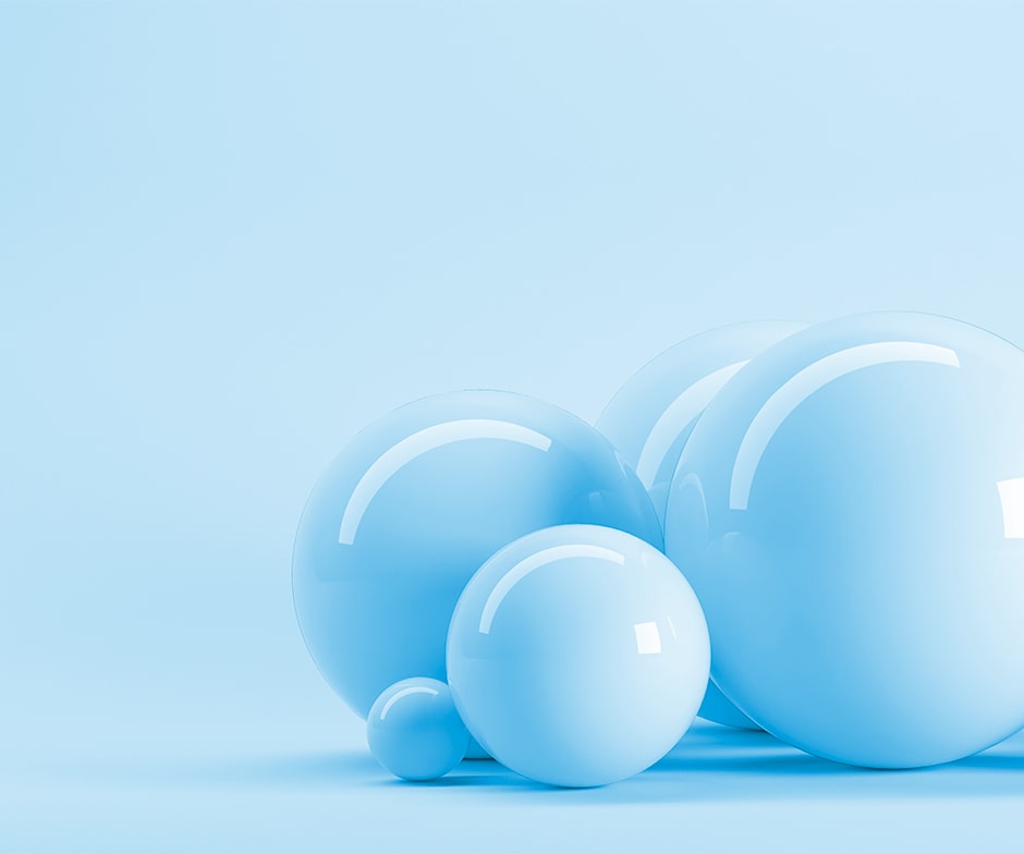 shiny blue spheres on light blue background
