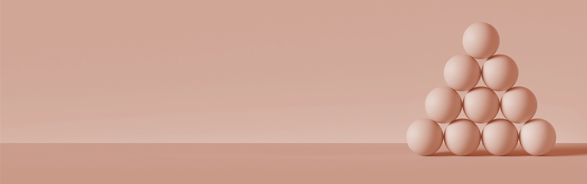 pink balls stacked into a triangle