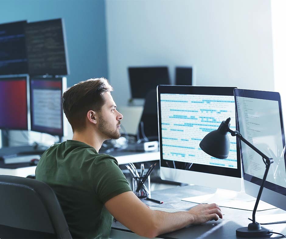 man working at computer