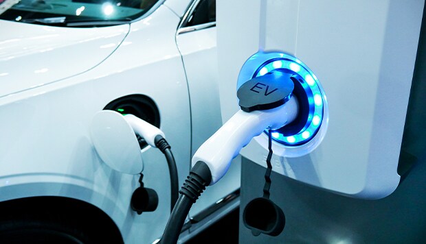 hybrid car being filled up