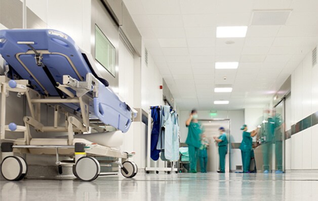 Hospital hallway with doctors 