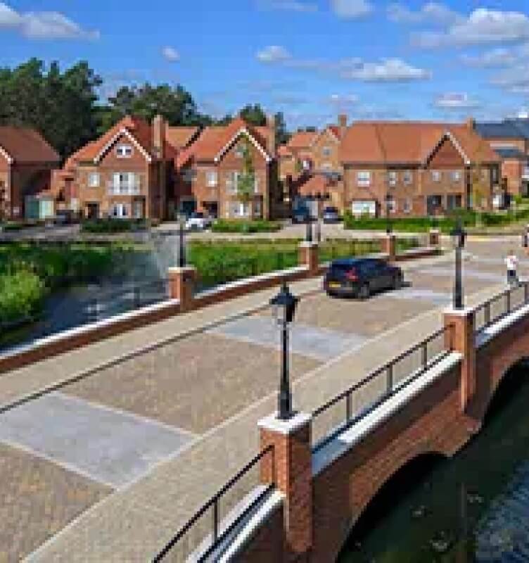 car driving over bridge