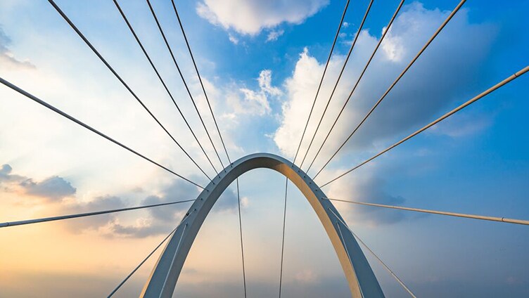 Top of bridge rising into the clouds