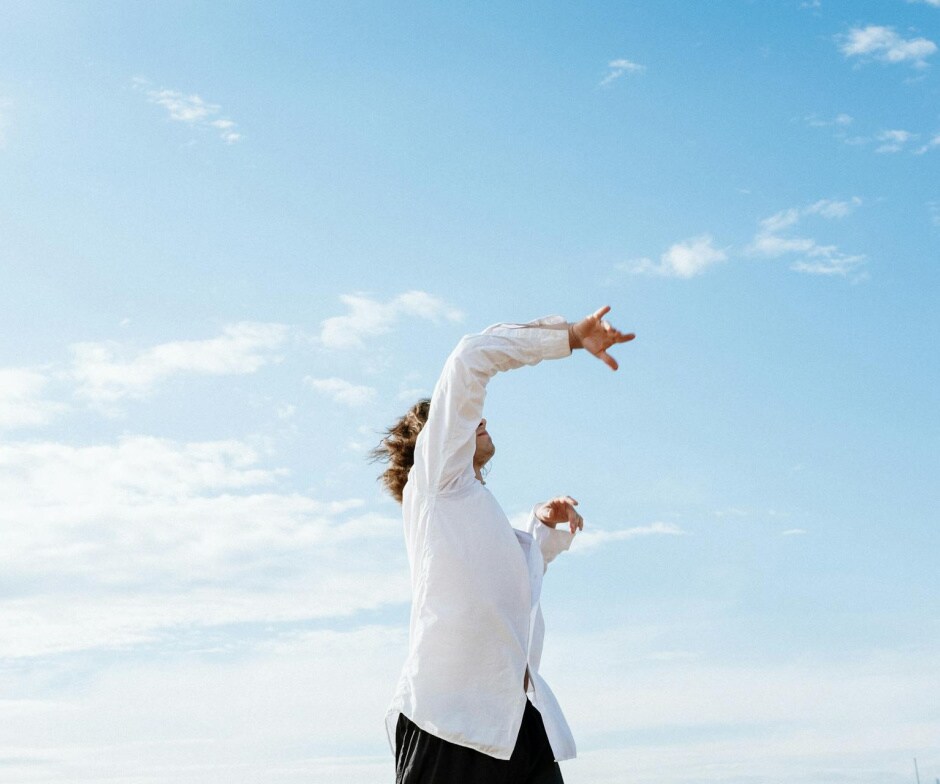 person wearing white shirt dancing