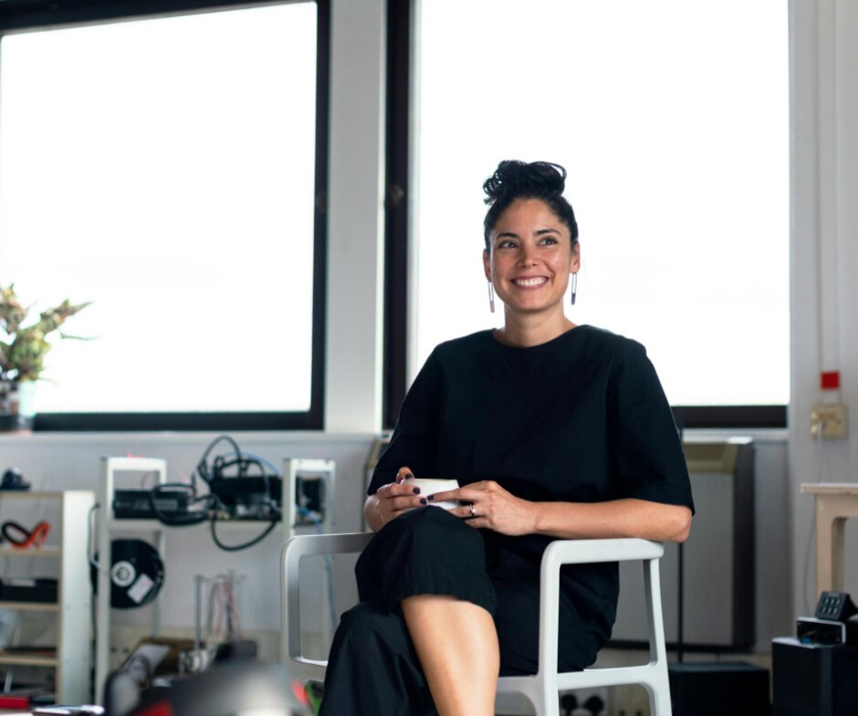 A Person sitting posing to camera