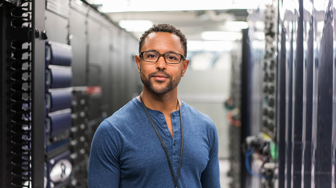 A Person posing to camera in the Machinery room