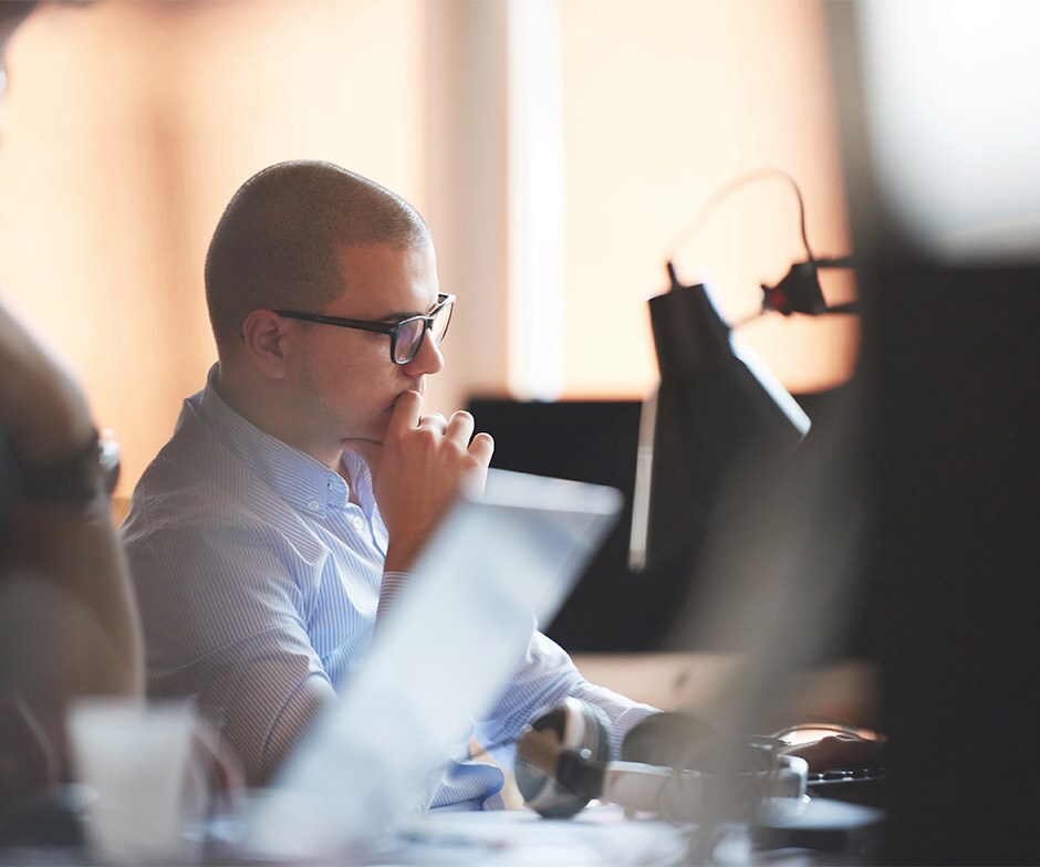 man looking at laptop