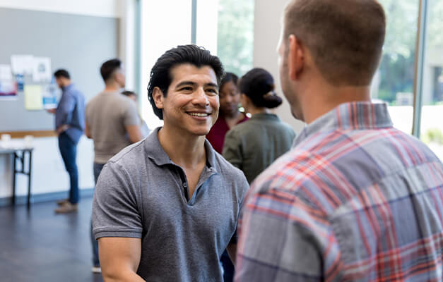 Two persons talking to each other