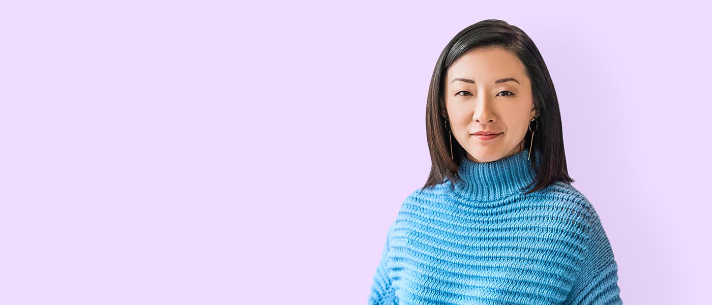 Person looking forward on a purple background