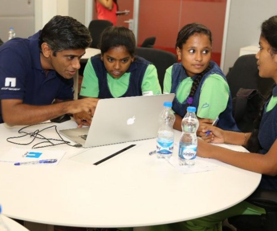 People working on a laptop